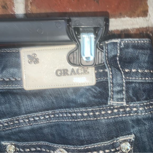 Grace in LA Boot Cut Dark Wash Jeans with Rhinestone Cross on Back Pocket - Picture 11 of 13